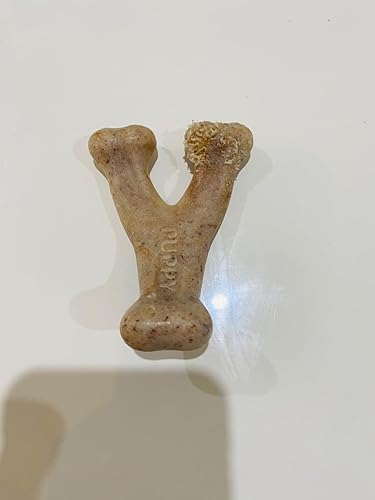 Dog bone-shaped treat with 'Pupperoni' branding on a white background
