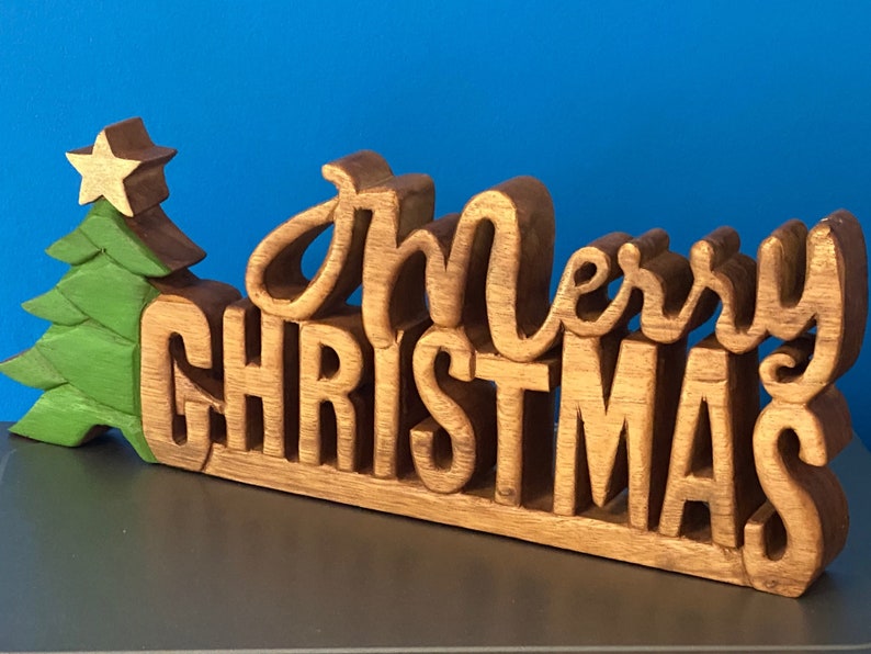 Wooden carved Merry Christmas decoration 38 cm long with Tree and Star Occasions > Christmas > Christmas Decorations Woofy and Whiskers