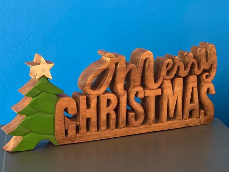 Wooden carved Merry Christmas decoration 38 cm long with Tree and Star Occasions > Christmas > Christmas Decorations Woofy and Whiskers