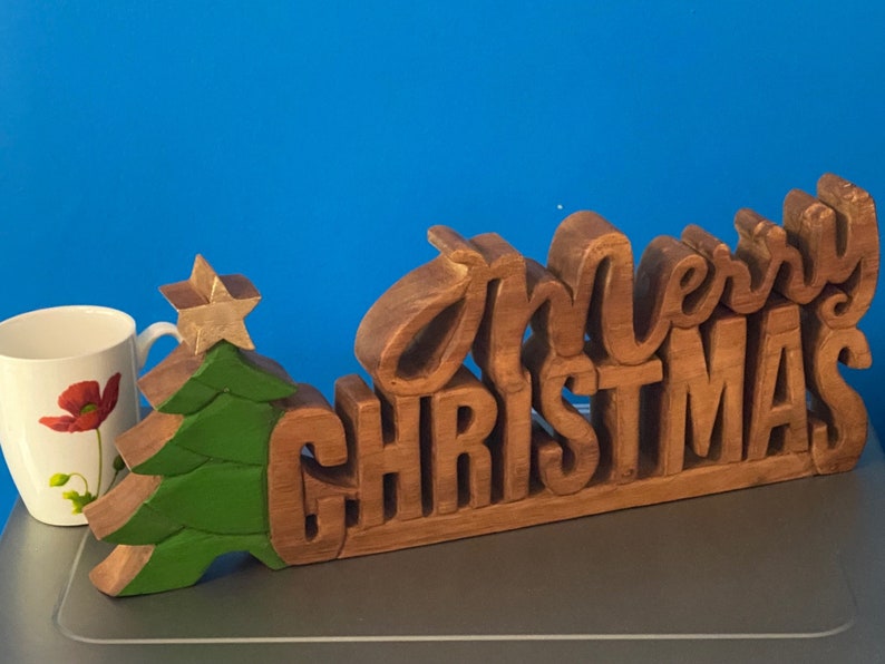 Wooden carved Merry Christmas decoration 38 cm long with Tree and Star Occasions > Christmas > Christmas Decorations Woofy and Whiskers
